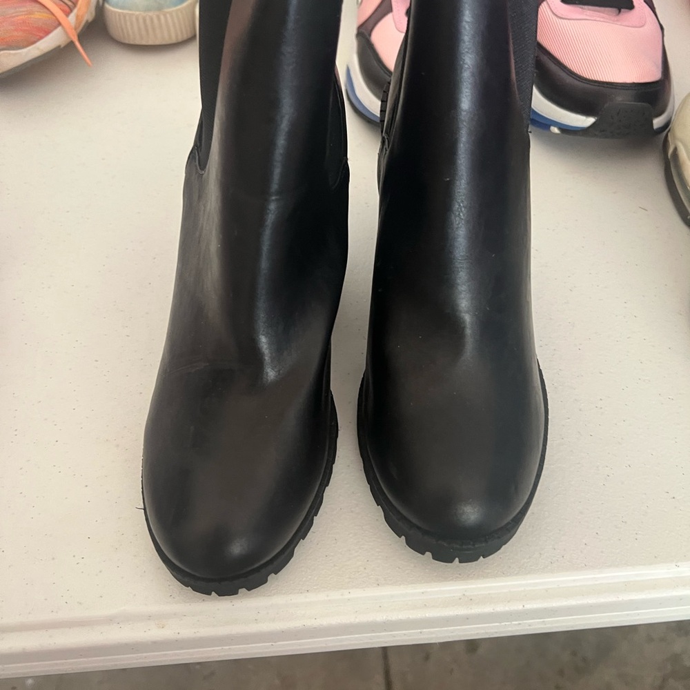 Sleek Black Ankle Boots with Rubber Sole